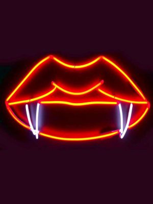labios con colmillos en neon